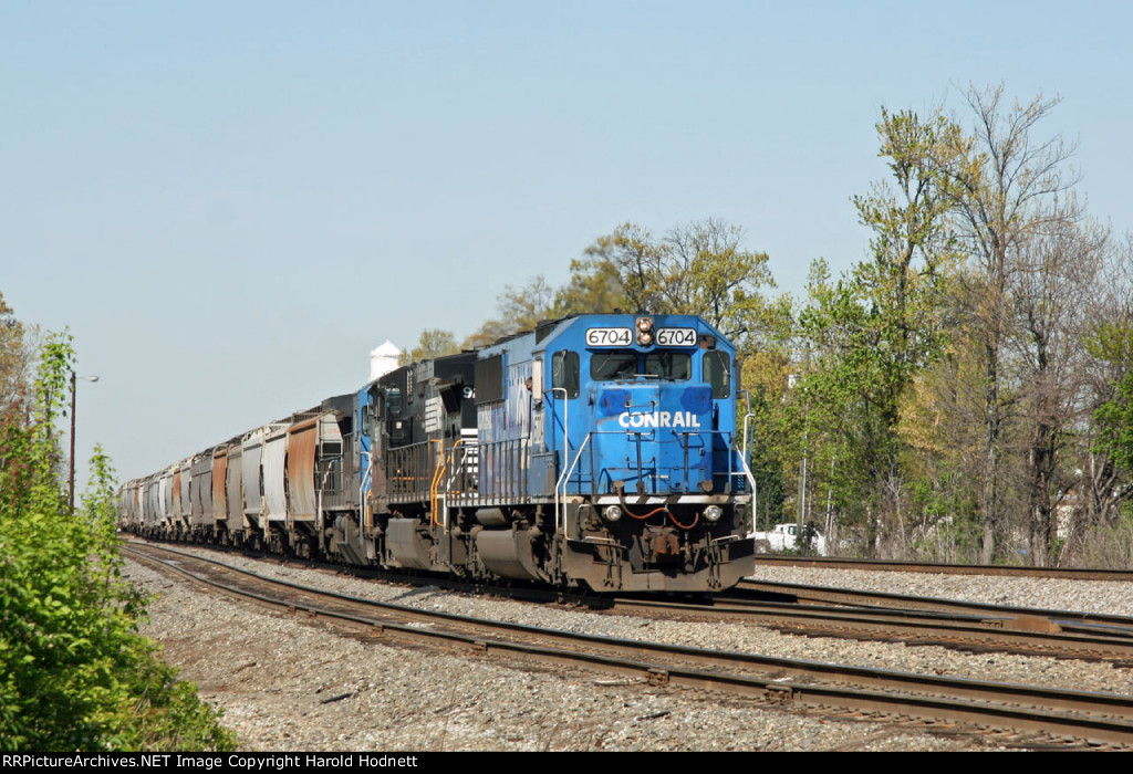 NS 6704 leads train 50T thru the yard